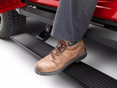 AMP Research PowerStep XL Black Plug N Play System - includes OEM style illumination - Crew Cab Only | 77238-01A