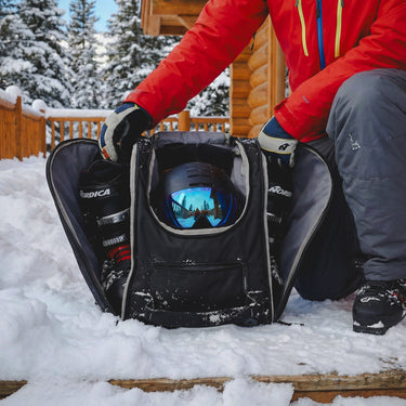 Mochila esencial de montaña para esquís, botas y casco