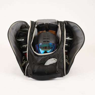 Mochila esencial de montaña para esquís, botas y casco