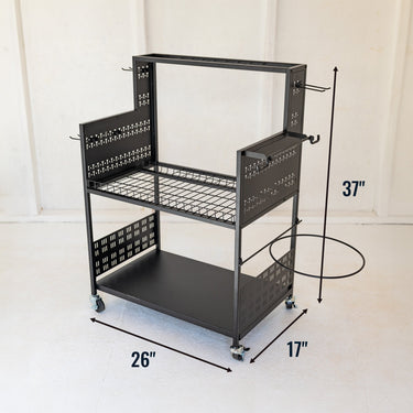 El carrito utilitario Everything con tablero perforado y soporte para cubos