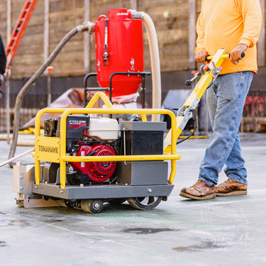 10-inch Early Entry Green Concrete Saw with 13 HP Honda GX390 engine by Tomahawk Power, featuring a durable cutting blade and sturdy frame.